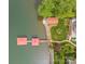 Aerial view of property showing boat dock, waterfront access and manicured lawn at 376 Oak Tree Rd # 37, Mooresville, NC 28117
