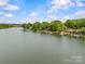 Picturesque lake view with beautiful homes, lush trees, and peaceful waterfront living at 376 Oak Tree Rd # 37, Mooresville, NC 28117