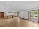 Spacious basement featuring wood flooring, a pool table and access to the lakefront at 376 Oak Tree Rd # 37, Mooresville, NC 28117