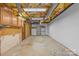 Unfinished basement with exposed ceiling and concrete floor at 376 Oak Tree Rd # 37, Mooresville, NC 28117