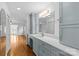 Stylish bathroom with quartz counters, custom cabinetry, and a contemporary mirror at 376 Oak Tree Rd # 37, Mooresville, NC 28117