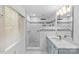Modern bathroom featuring a quartz countertop vanity and a tiled shower at 376 Oak Tree Rd # 37, Mooresville, NC 28117