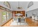 Dining room with seating for six, built in cabinets, and access to balcony with lake view at 376 Oak Tree Rd # 37, Mooresville, NC 28117