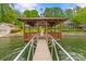 Charming dock with wooden gazebo offering scenic views of the waterfront at 376 Oak Tree Rd # 37, Mooresville, NC 28117