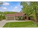 Charming home featuring a manicured lawn, stone accents, and a two-car garage at 376 Oak Tree Rd # 37, Mooresville, NC 28117