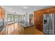 Lake view kitchen featuring cherry cabinets, stainless steel appliances, and central island at 376 Oak Tree Rd # 37, Mooresville, NC 28117
