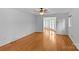 Spacious room offering hardwood floors, ample natural light, and access to the outdoors at 376 Oak Tree Rd # 37, Mooresville, NC 28117