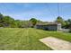 Side view of home featuring a large backyard at 500 Dedmon Dr, Charlotte, NC 28216