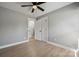 Bedroom featuring a closet with panel doors and neutral paint throughout at 500 Dedmon Dr, Charlotte, NC 28216