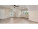 Large bedroom with modern ceiling fan and many windows for ample natural light at 5162 Beckenham Ln, Concord, NC 28025