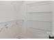 A walk-in closet with metal shelving for organized storage at 5162 Beckenham Ln, Concord, NC 28025