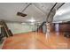 View of unfinished basement space with stairs and utilities at 5938 Mundy Rd, Denver, NC 28037