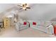 Generous bonus room featuring sloped ceilings, sofas, and a ceiling fan at 6002 Sentinel Dr, Indian Trail, NC 28079