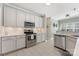 Bright kitchen with stainless steel appliances, white subway tile backsplash, and easy access to the adjacent dining area at 6002 Sentinel Dr, Indian Trail, NC 28079