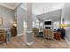 Inviting living room with a fireplace, large TV, and comfortable seating area at 6002 Sentinel Dr, Indian Trail, NC 28079