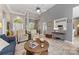 Bright and airy living room with an open floor plan, high ceilings, and an easy transition to other living spaces at 6002 Sentinel Dr, Indian Trail, NC 28079