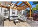 Covered patio with comfortable seating and stylish decor at 6002 Sentinel Dr, Indian Trail, NC 28079
