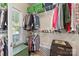 Functional walk-in closet offering ample storage space with shelves and hanging racks at 6002 Sentinel Dr, Indian Trail, NC 28079