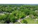 Aerial view of neighborhood showcasing lush green trees and tranquil residential streets at 625 4Th Street Nw Dr, Hickory, NC 28601