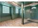 Spacious basement with exposed brick and paneled walls, offering potential for customization and various uses at 625 4Th Street Nw Dr, Hickory, NC 28601
