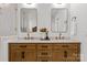 Bathroom features double vanity with marble countertop and brass fixtures at 625 4Th Street Nw Dr, Hickory, NC 28601