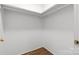Walk-in closet with overhead lighting and wood flooring offers plenty of room for storage at 625 4Th Street Nw Dr, Hickory, NC 28601