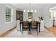 Elegant dining room featuring classic furniture, large windows, and stylish lighting, perfect for formal dinners at 625 4Th Street Nw Dr, Hickory, NC 28601