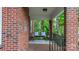 Cozy covered front porch with seating area, perfect for relaxing and enjoying the outdoors at 625 4Th Street Nw Dr, Hickory, NC 28601