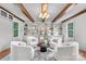Bright living room with wood floors, exposed beams, and custom built-ins at 625 4Th Street Nw Dr, Hickory, NC 28601