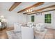 Bright living room with wood floors, paneled walls, and contemporary accent chairs at 625 4Th Street Nw Dr, Hickory, NC 28601