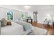 Serene bedroom with natural light, wood floors, and a decorative console table at 625 4Th Street Nw Dr, Hickory, NC 28601
