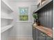 Pantry with built in shelving, butcher block counters and ample storage space at 625 4Th Street Nw Dr, Hickory, NC 28601