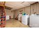 Basement laundry room with washer, dryer, and unfinished ceiling at 6312 Bill Ledford Rd, Vale, NC 28168