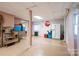 Spacious basement with tile flooring, and a vintage STOP sign, and a vintage decor at 6312 Bill Ledford Rd, Vale, NC 28168