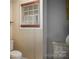 Neutral bathroom with natural wood blinds over the window for natural light at 6312 Bill Ledford Rd, Vale, NC 28168