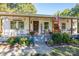 Inviting covered porch features ample seating, decorative touches, and a warm, welcoming atmosphere at 6312 Bill Ledford Rd, Vale, NC 28168