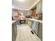 Kitchen with stainless steel appliances, ample countertop space and painted cabinets at 6312 Bill Ledford Rd, Vale, NC 28168