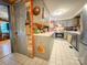 View of the kitchen with painted cabinets and stainless steel appliances at 6312 Bill Ledford Rd, Vale, NC 28168