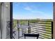 City views from a modern balcony featuring a table and chairs at 715 N Church St # 816, Charlotte, NC 28202