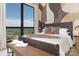 Luxurious bedroom with a large window and stylish decor at 715 N Church St # 816, Charlotte, NC 28202