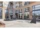 Modern building courtyard with unique outdoor seating, contemporary art and views of balconies at 715 N Church St # 816, Charlotte, NC 28202