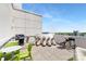 Outdoor deck with grilling station and contemporary furnishings, perfect for entertaining at 715 N Church St # 816, Charlotte, NC 28202
