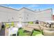 An outdoor deck with modern outdoor seating, grilling station and panoramic views at 715 N Church St # 816, Charlotte, NC 28202