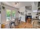 Charming breakfast nook with a round table, metal chairs, and natural light from french doors at 7300 Chatterbird Ct, Charlotte, NC 28226
