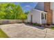 This home features a long driveway, partial fencing and a brick chimney, providing ample parking and privacy at 7300 Chatterbird Ct, Charlotte, NC 28226