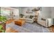 Inviting living room showcasing stylish decor, a plush sofa, and an open view to the dining area at 7300 Chatterbird Ct, Charlotte, NC 28226