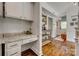 Charming office nook with granite countertops, custom cabinets, and updated fixtures and access to the outdoor patio at 7300 Chatterbird Ct, Charlotte, NC 28226