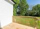 A wooden back deck overlooks a lush, green backyard at 803 Blackmon St, Rock Hill, SC 29730