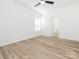 Bright, airy bedroom with large window and light wood flooring at 803 Blackmon St, Rock Hill, SC 29730