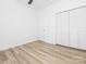 A bright bedroom features vinyl floors, a ceiling fan, and a closet at 803 Blackmon St, Rock Hill, SC 29730